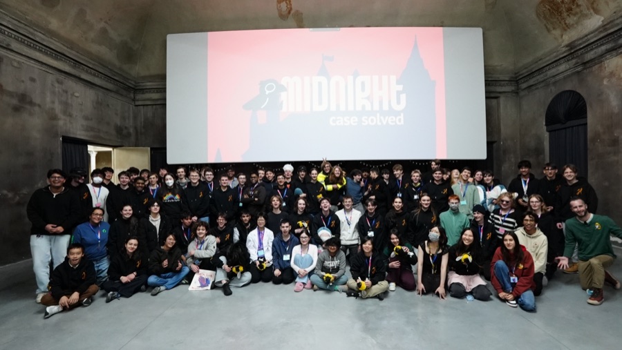 About 80 Hack Clubbers in front of a Midnight, case solved screen