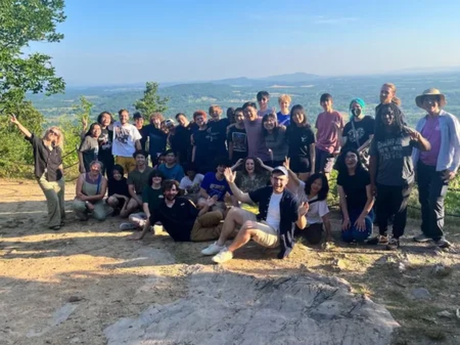 A group photo on a hilltop
